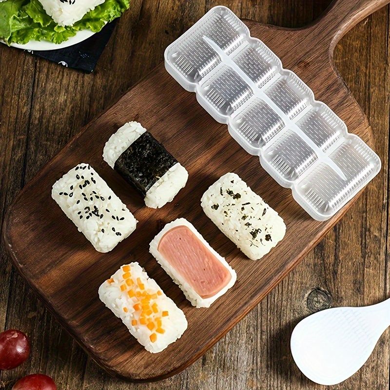 Sushi formička z průhledného plastu na malé rýžové kuličky a ruční sushi