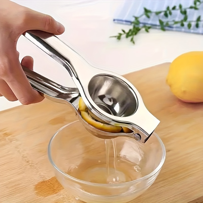 Nerezový ruční šťavňovač na citrusy - univerzální lis na citrony a pomeranče